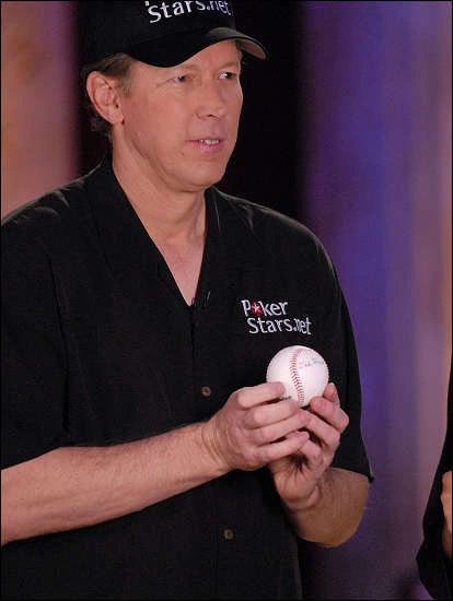 Orel Hershiser holding a baseball in a studio-style portrait