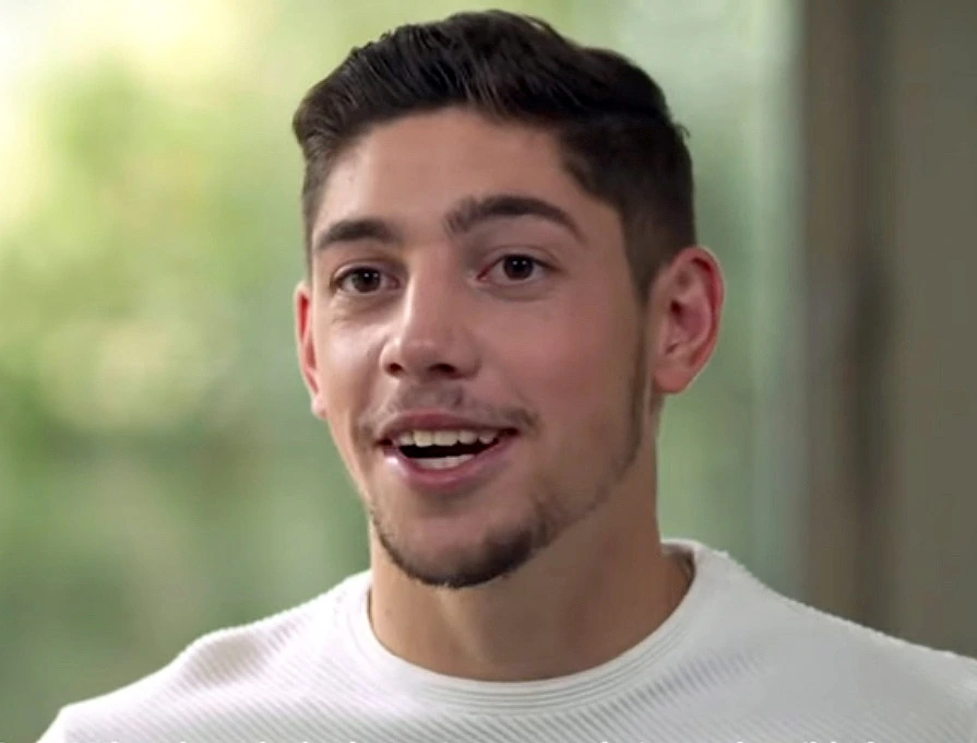 Federico Valverde in a close-up interview shot, wearing a white shirt with a blurred background.