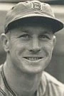 Rick Sutcliffe in a baseball cap, smiling portrait photo