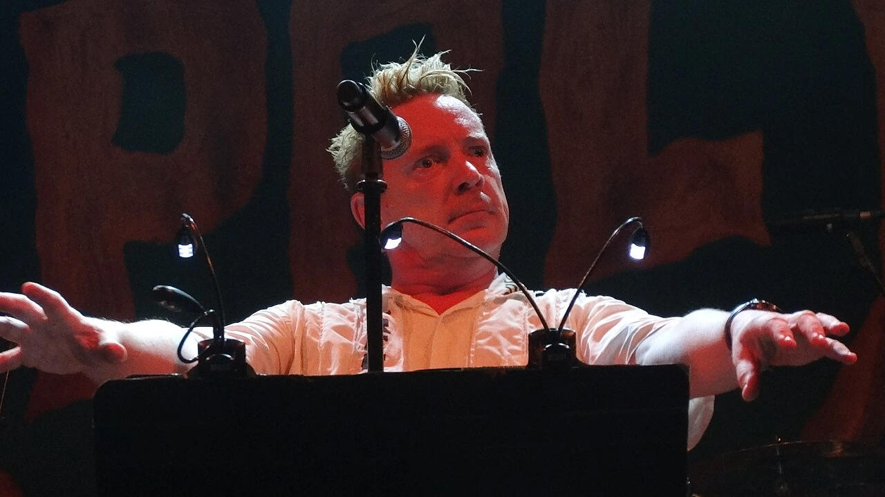 John Lydon performing live on stage with Public Image Ltd.