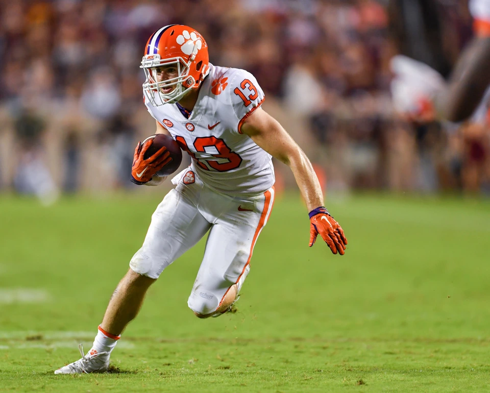 Hunter Renfrow running with the football in a Clemson uniform during a game