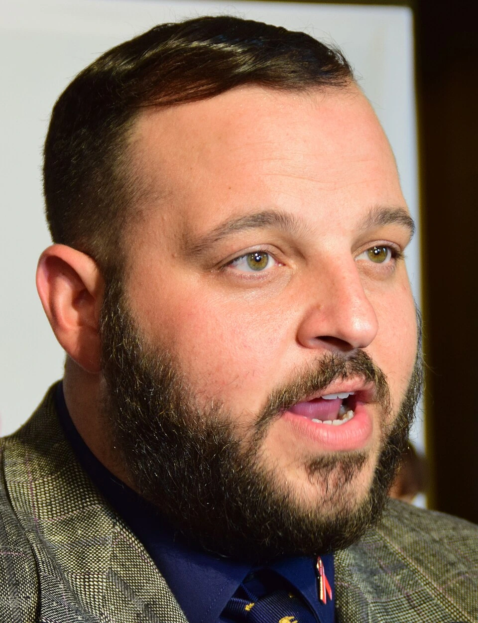Daniel Franzese speaking at an event, close-up portrait
