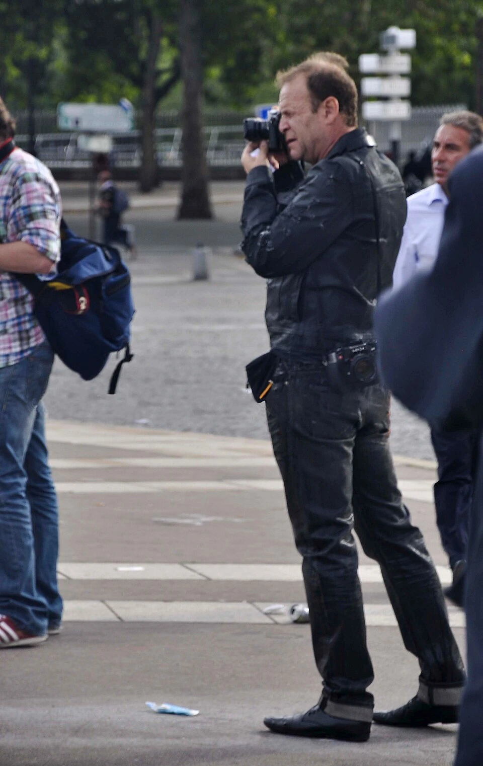 François-Marie Banier photographing at a public gathering