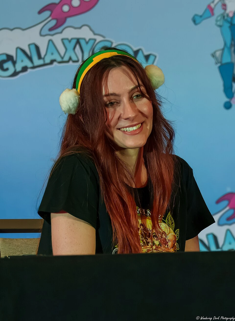Michaela Jill Murphy speaking at a convention panel
