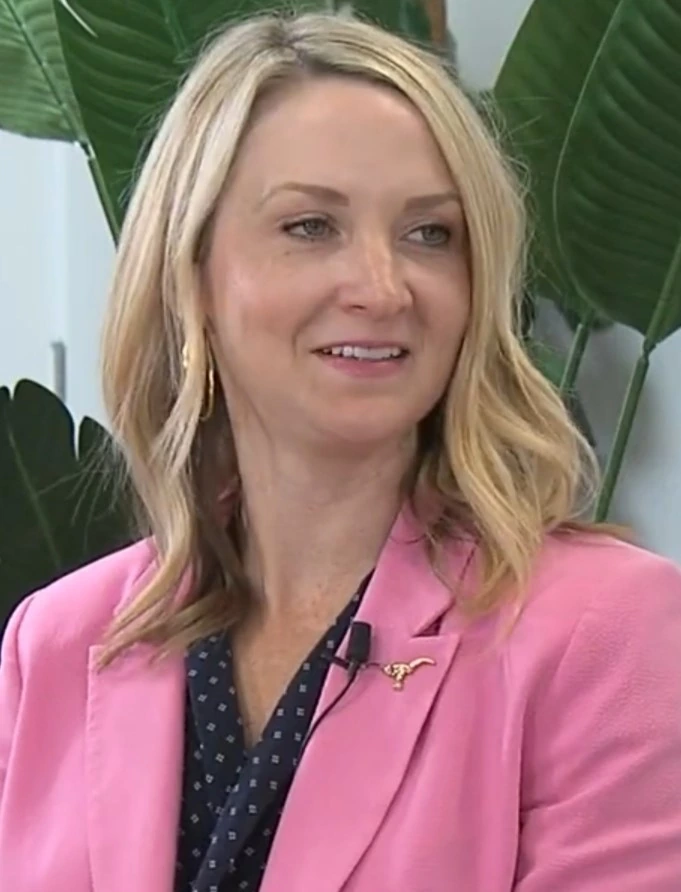 Portrait photo of Mattie Parker, mayor of Fort Worth, smiling in a pink blazer.