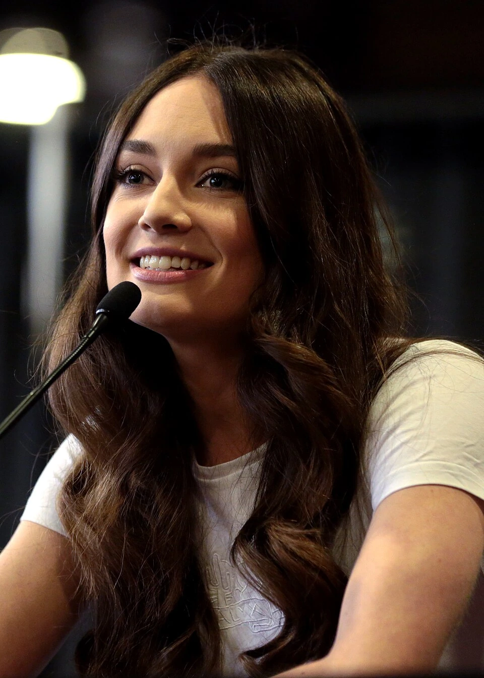 Mallory Jansen speaking at an event
