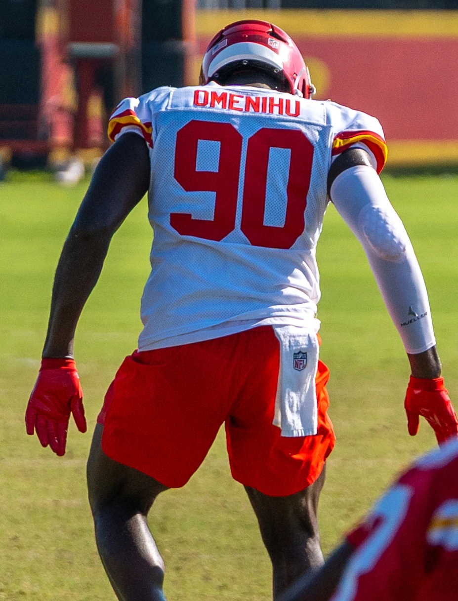Charles Omenihu in a Washington Commanders uniform on the field