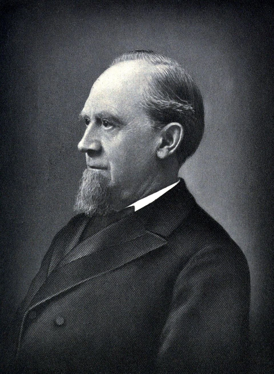 Black-and-white portrait of Charles Pratt in profile, wearing a suit and goatee.