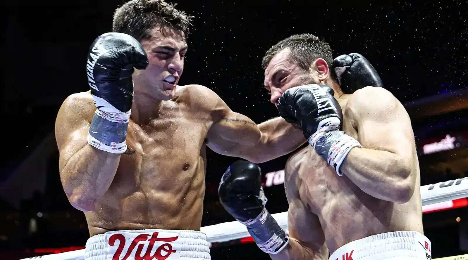 Action photo of Vito Mielnicki Jr. boxing in the ring