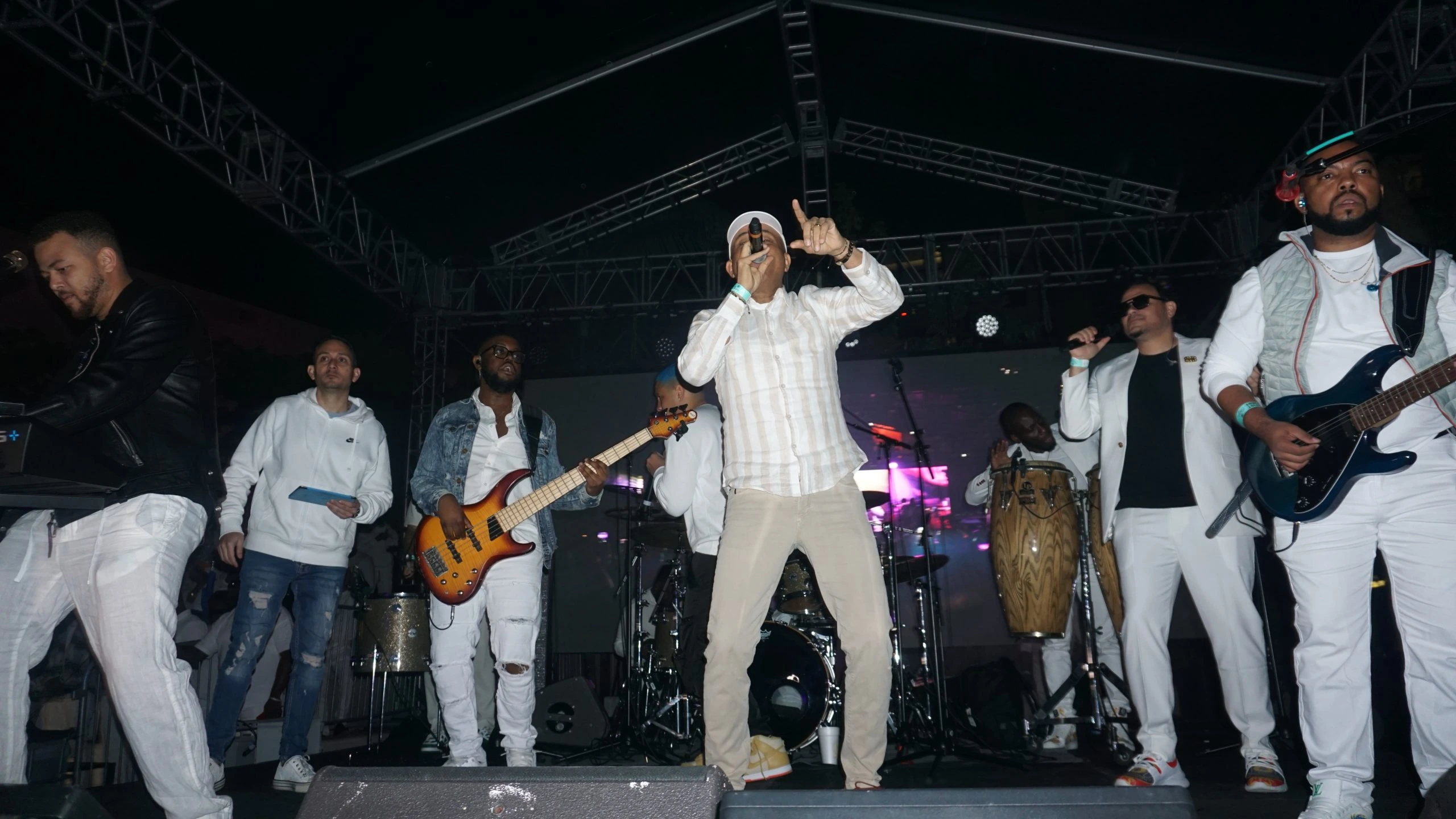 Michel-Olivier Martelly performing on stage with his band