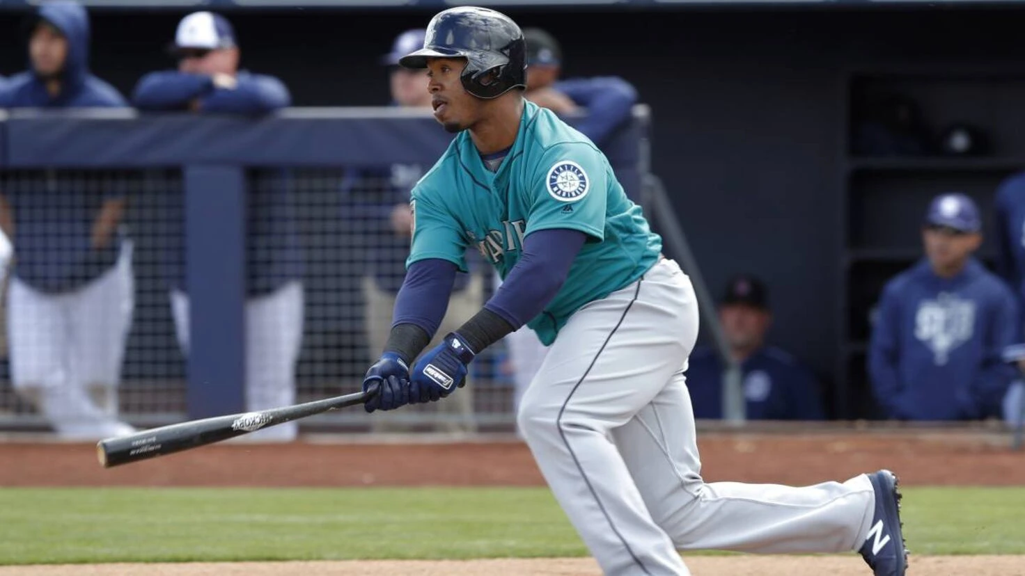 Jean Segura batting in a Seattle Mariners uniform during a game.