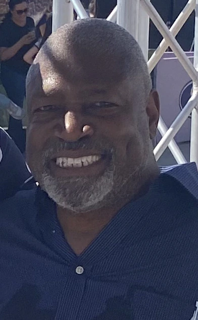 Charles Haley smiling in a candid portrait