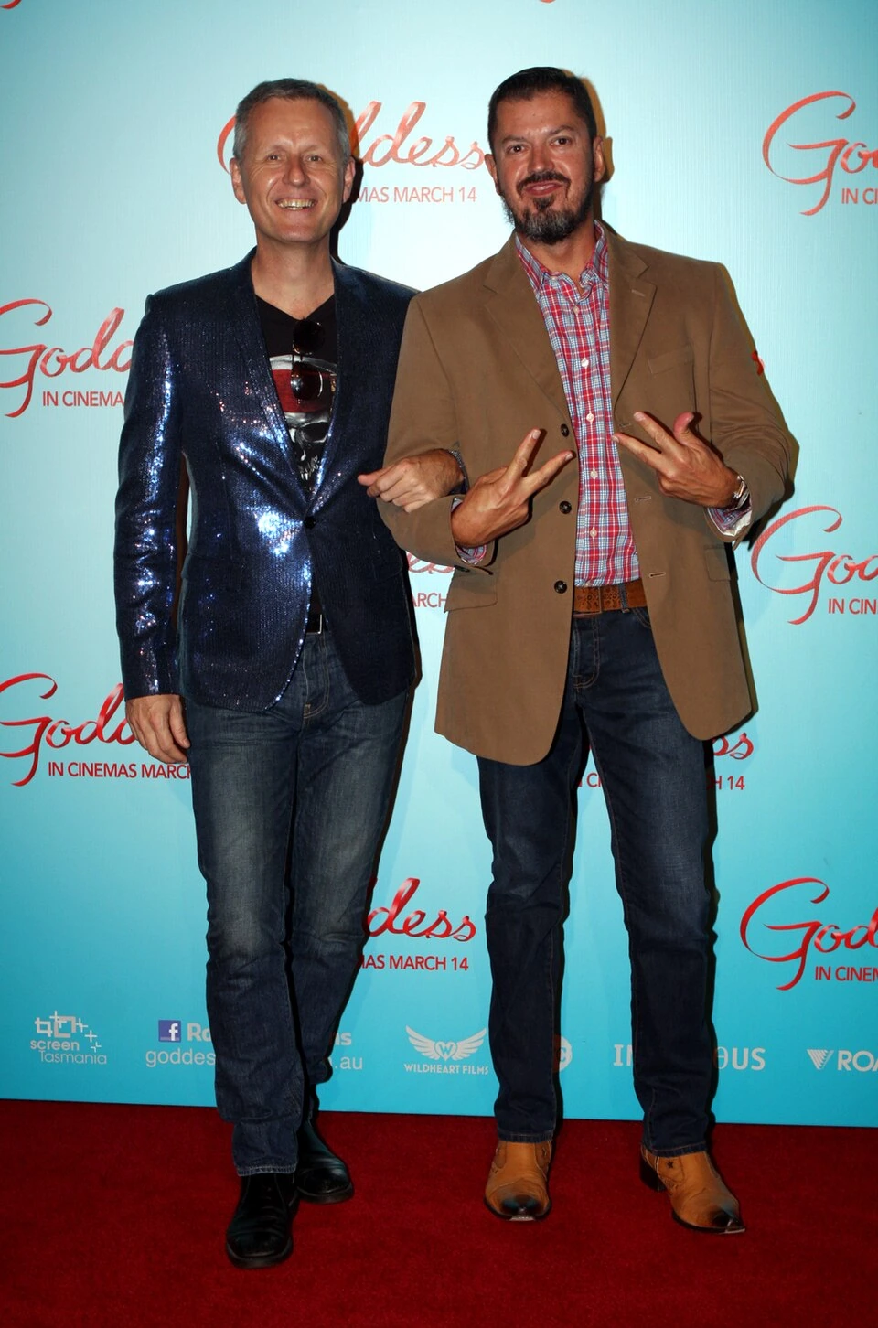 Mark Trevorrow posing at a red-carpet event