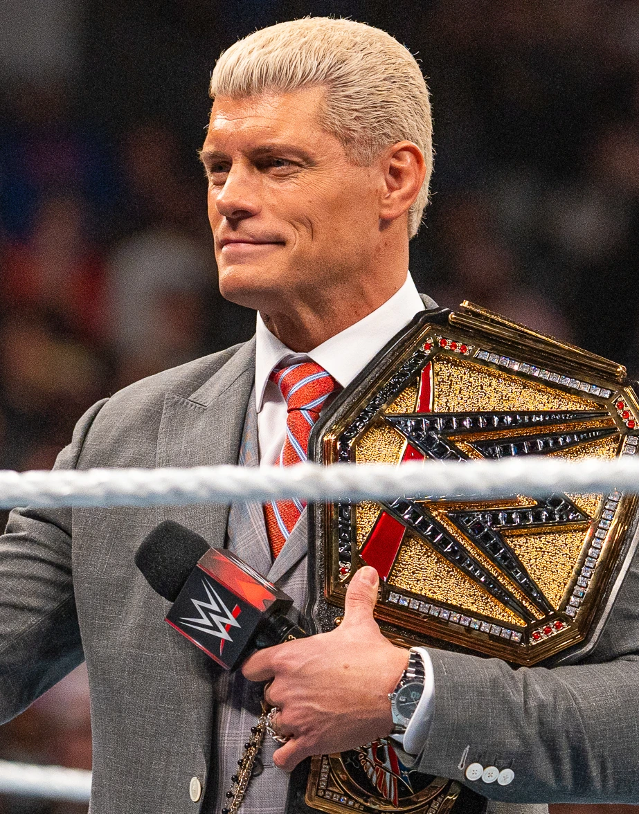 Cody Rhodes at WWE event holding championship belt