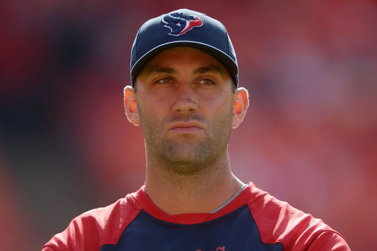 Matt Schaub in a Houston Texans cap and practice shirt