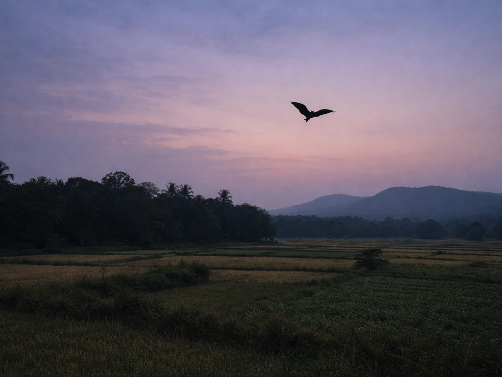 Dusk over a Marathi landscape with a silhouetted bat-like bird near tree lines