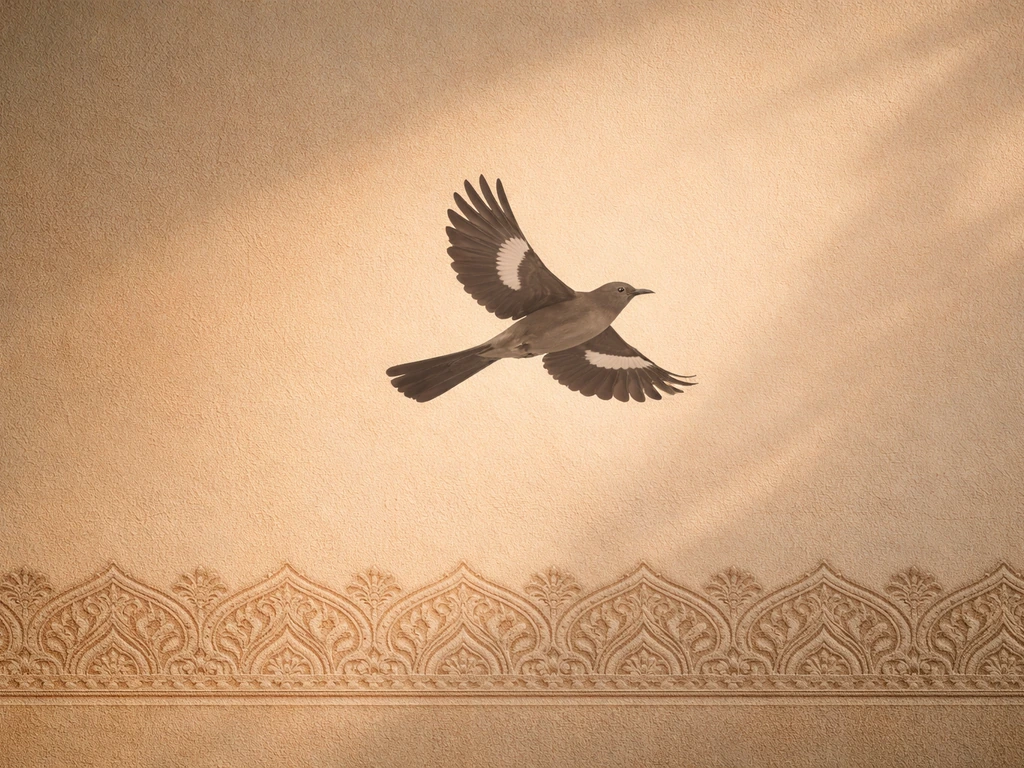 Minimal Indian patterned border motif contrasted with a non-native mockingbird silhouette in flight.