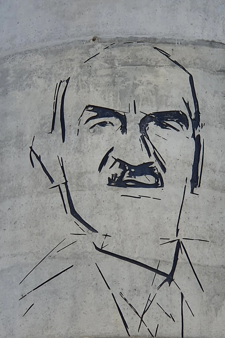 Portrait of António de Sommer Champalimaud mural or artwork in Lisbon, likely based on the philanthropist's likeness.
