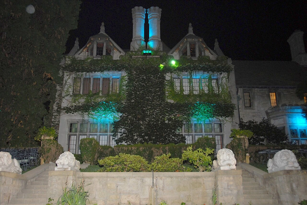 The Playboy Mansion exterior at night in Holmby Hills, Los Angeles