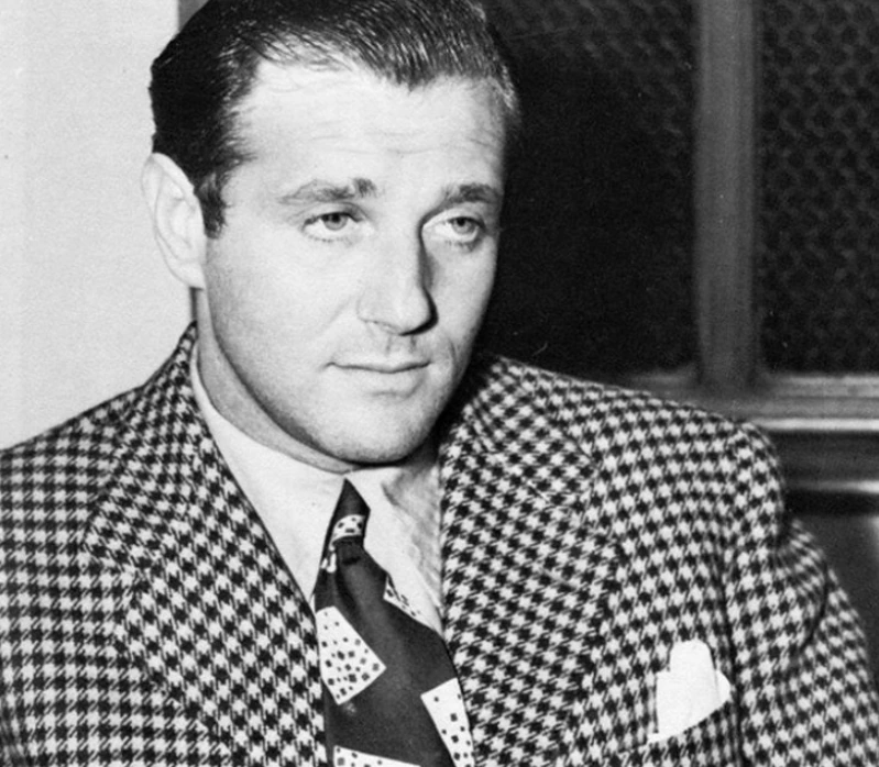 Black-and-white portrait of Bugsy Siegel in a suit and tie