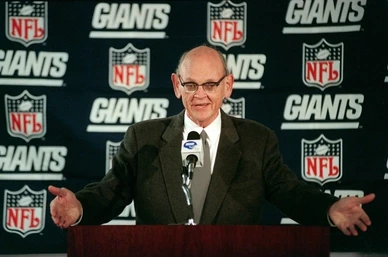 Ernie Accorsi speaking at a New York Giants press conference