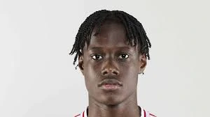 Bendito Mantato in a Manchester United kit during a football photo shoot