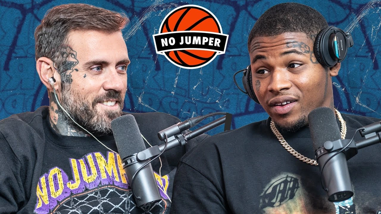 ASM Bopster in a No Jumper interview, seated beside a host with microphones and headphones