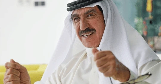 Mohi-Din Binhendi smiling in traditional Emirati attire
