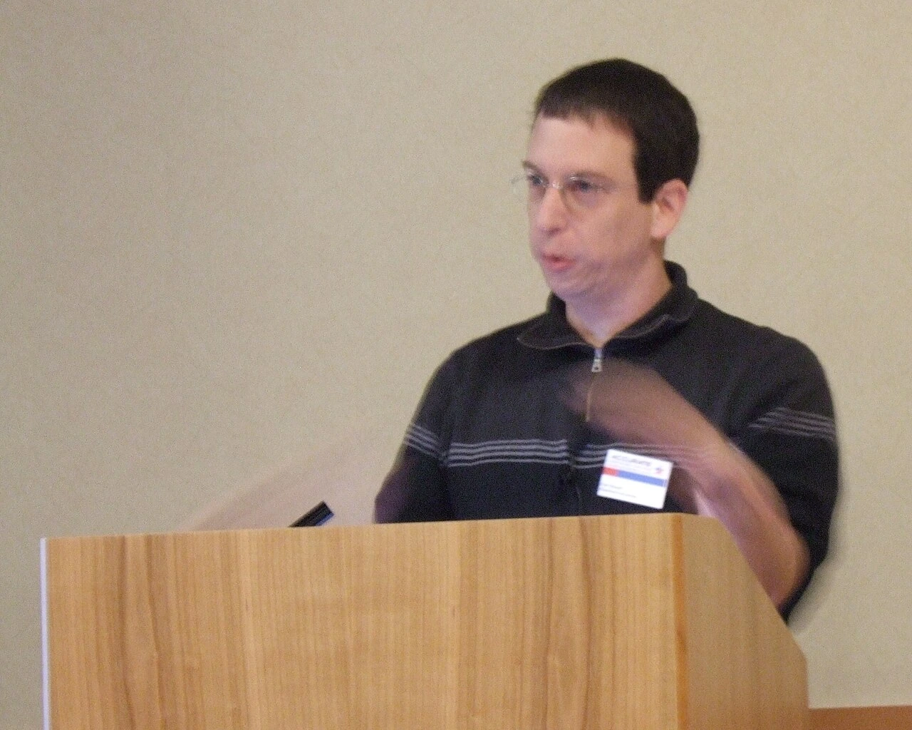 Dan Boneh speaking at a podium