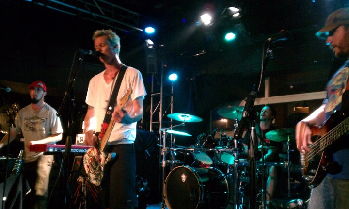 Ballyhoo! performing live on stage under concert lights