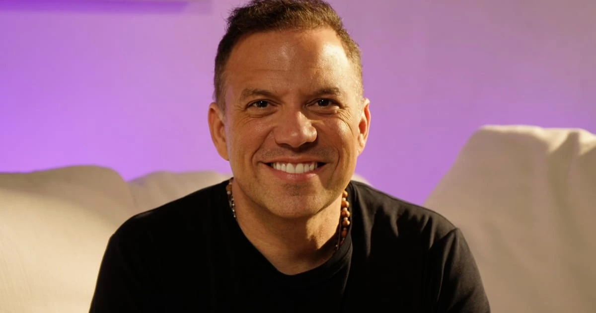 Portrait photo of Santiago Botero Jaramillo smiling indoors