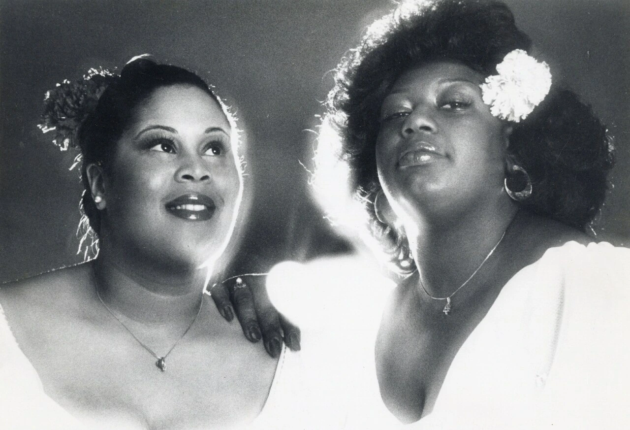 Black-and-white portrait of Izora Armstead with another woman, likely from The Weather Girls era
