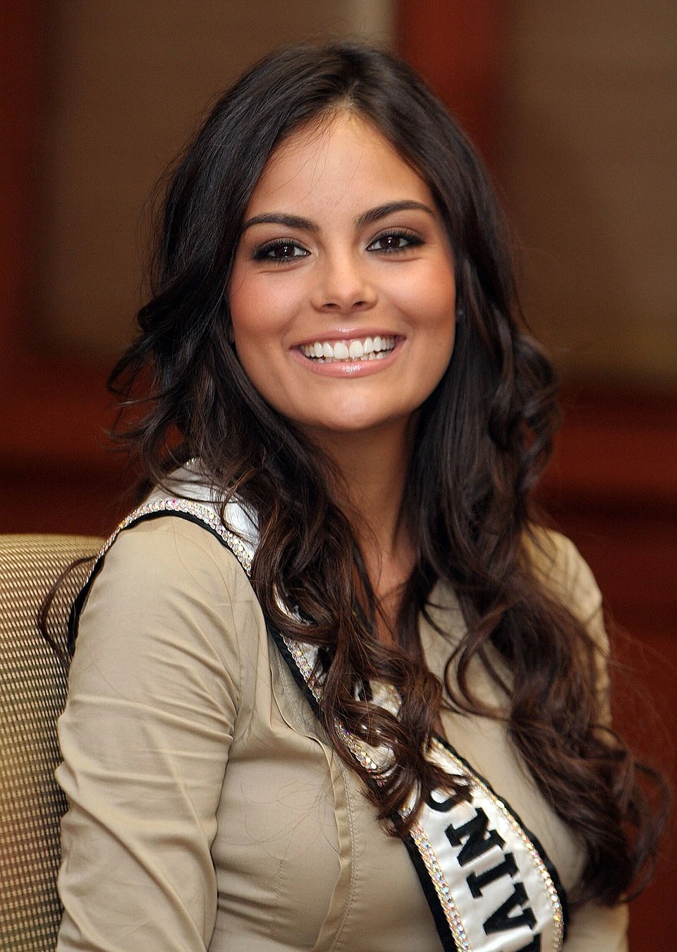 Ximena Navarrete smiling in a portrait photo wearing a sash.