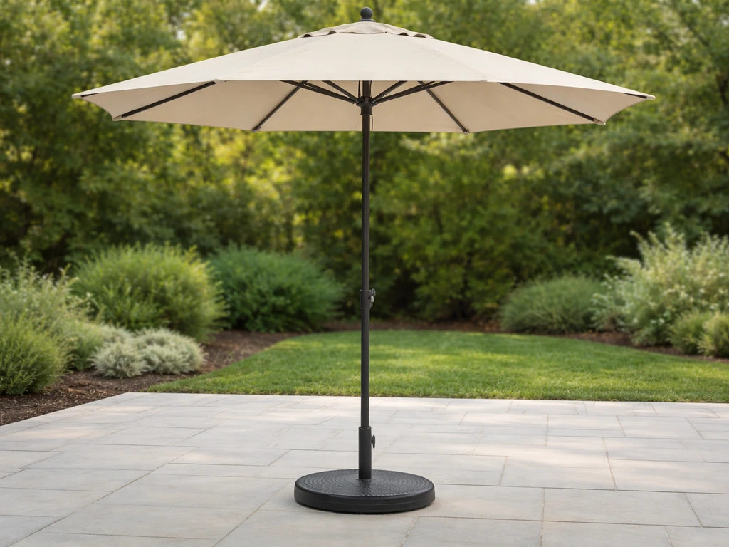 Straight upright patio umbrella on a leveled patio with the weighted base clearly visible.