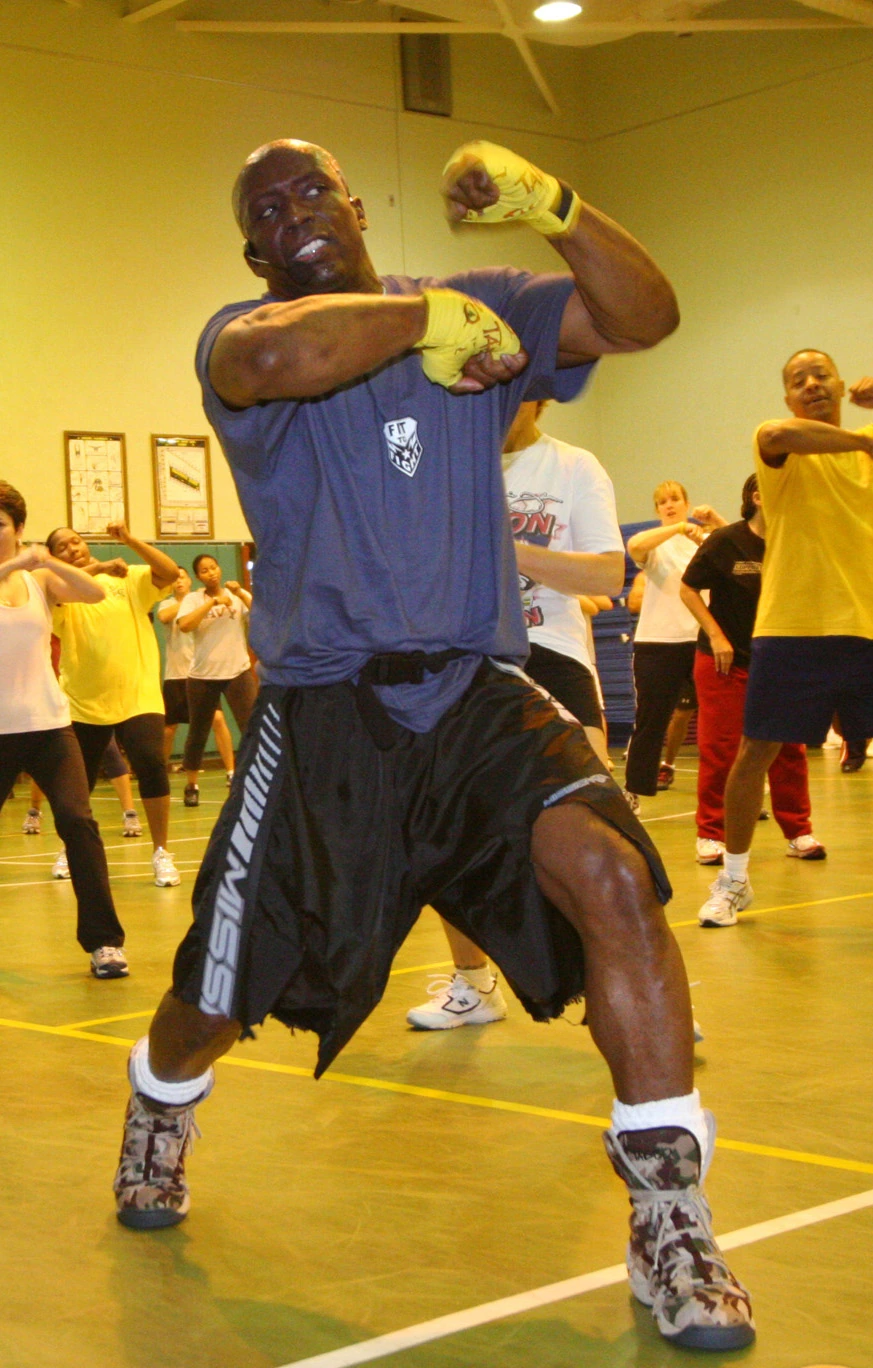 Billy Blanks leading a fitness class indoors