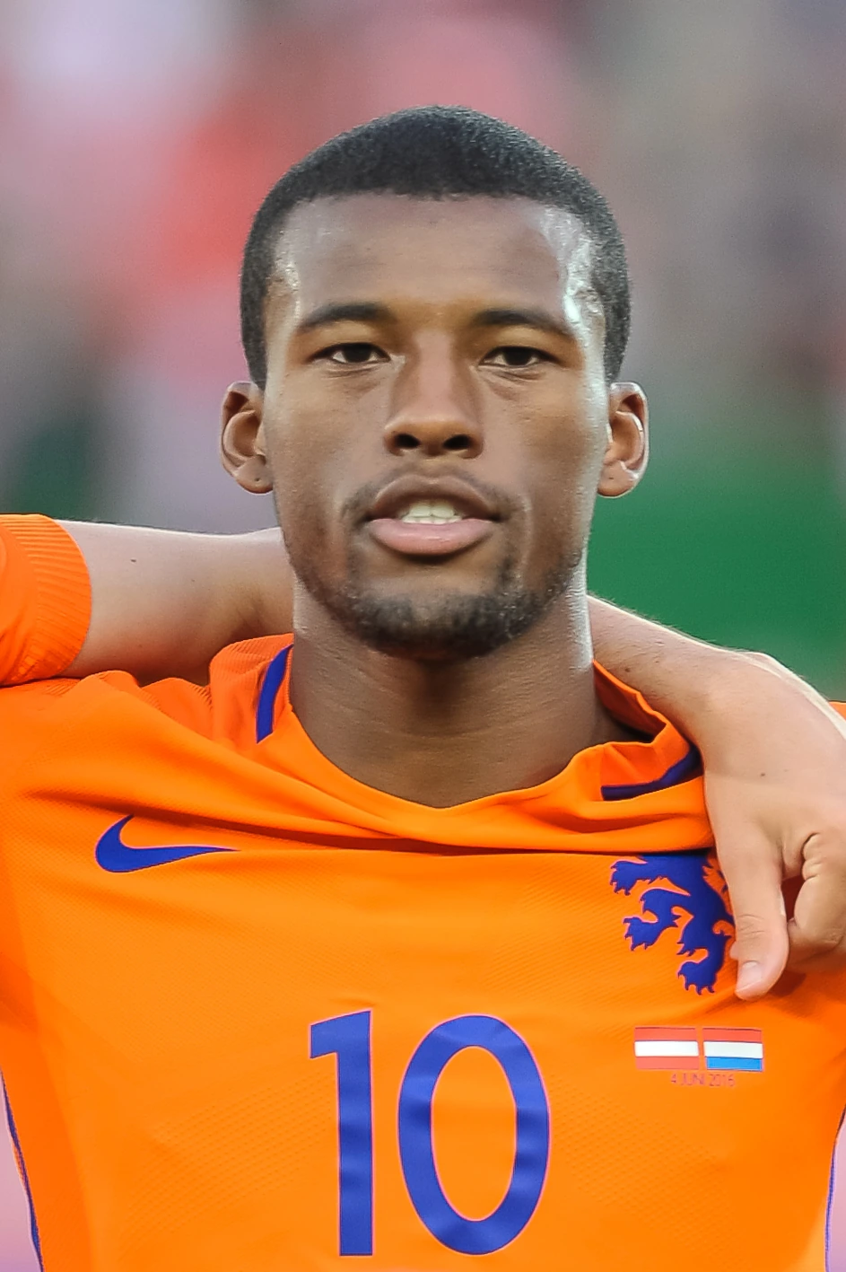 Georginio Wijnaldum in an orange Netherlands football shirt