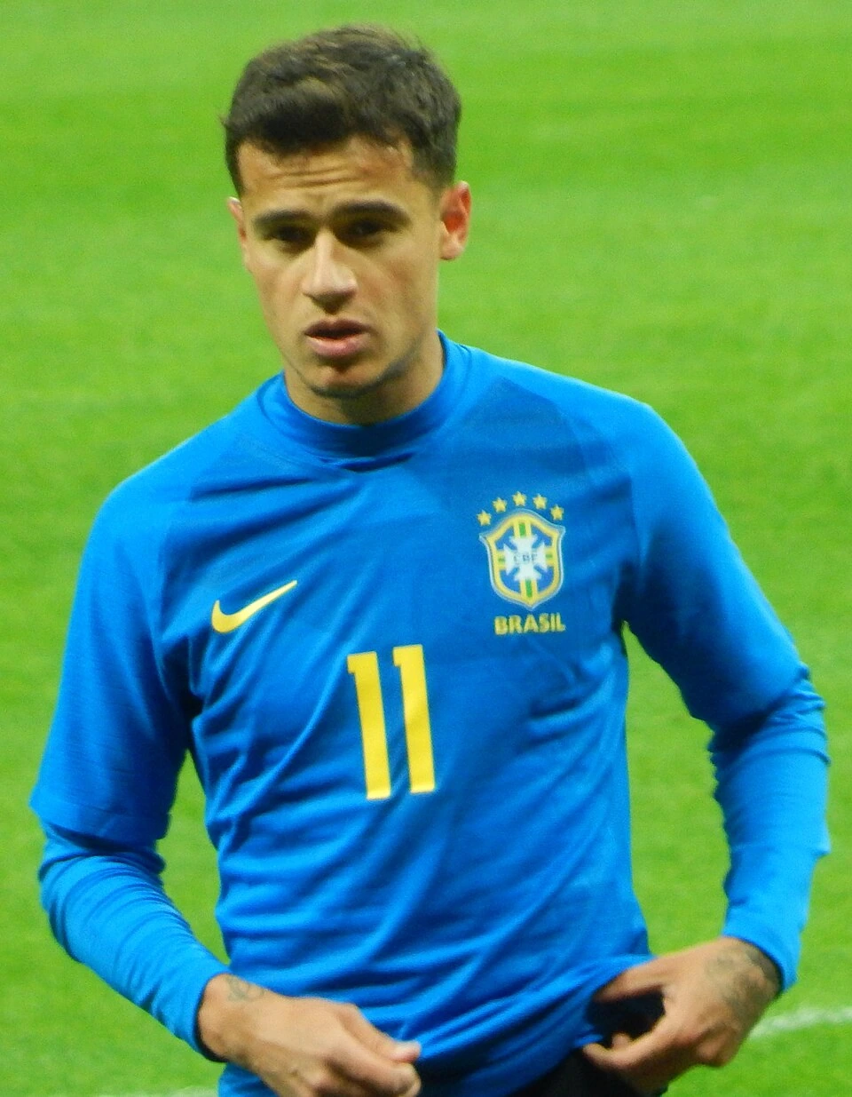 Philippe Coutinho in a Brazil national team kit on the pitch