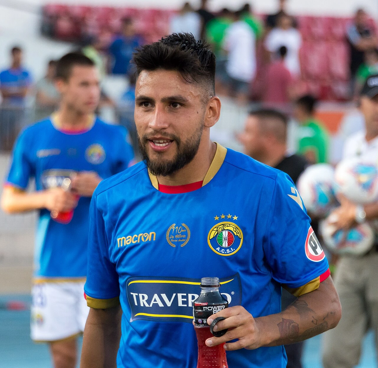 Mexican footballer Diego Torres in a blue jersey on the pitch