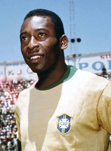 Pelé in a Brazil football shirt at a stadium