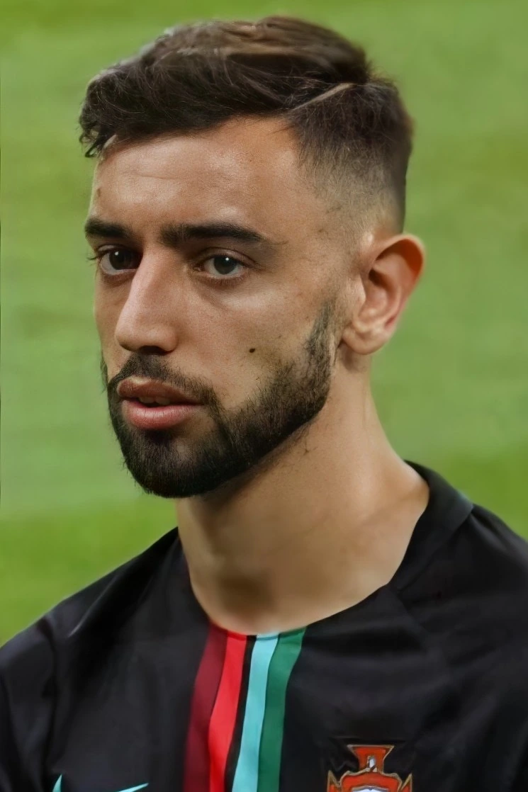 Portrait of Bruno Fernandes in a Portugal kit on the pitch