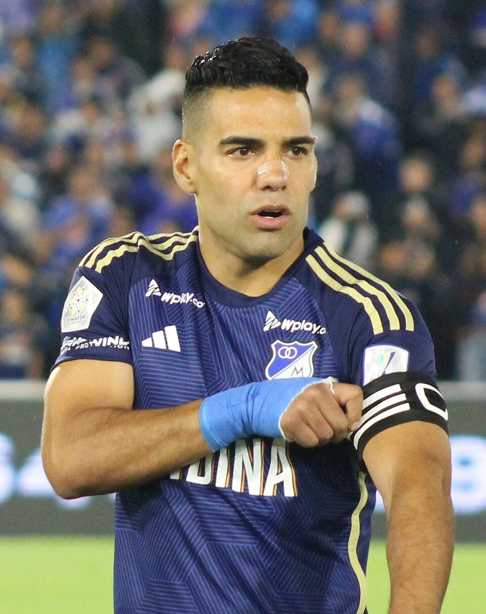 Radamel Falcao in a blue Millonarios jersey during a match, close-up editorial sports photo