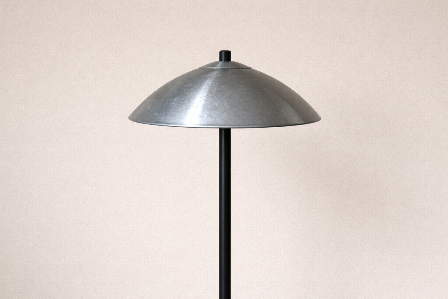 One squirrel-resistant feeder or pole baffle shown alone to illustrate pest hardware.