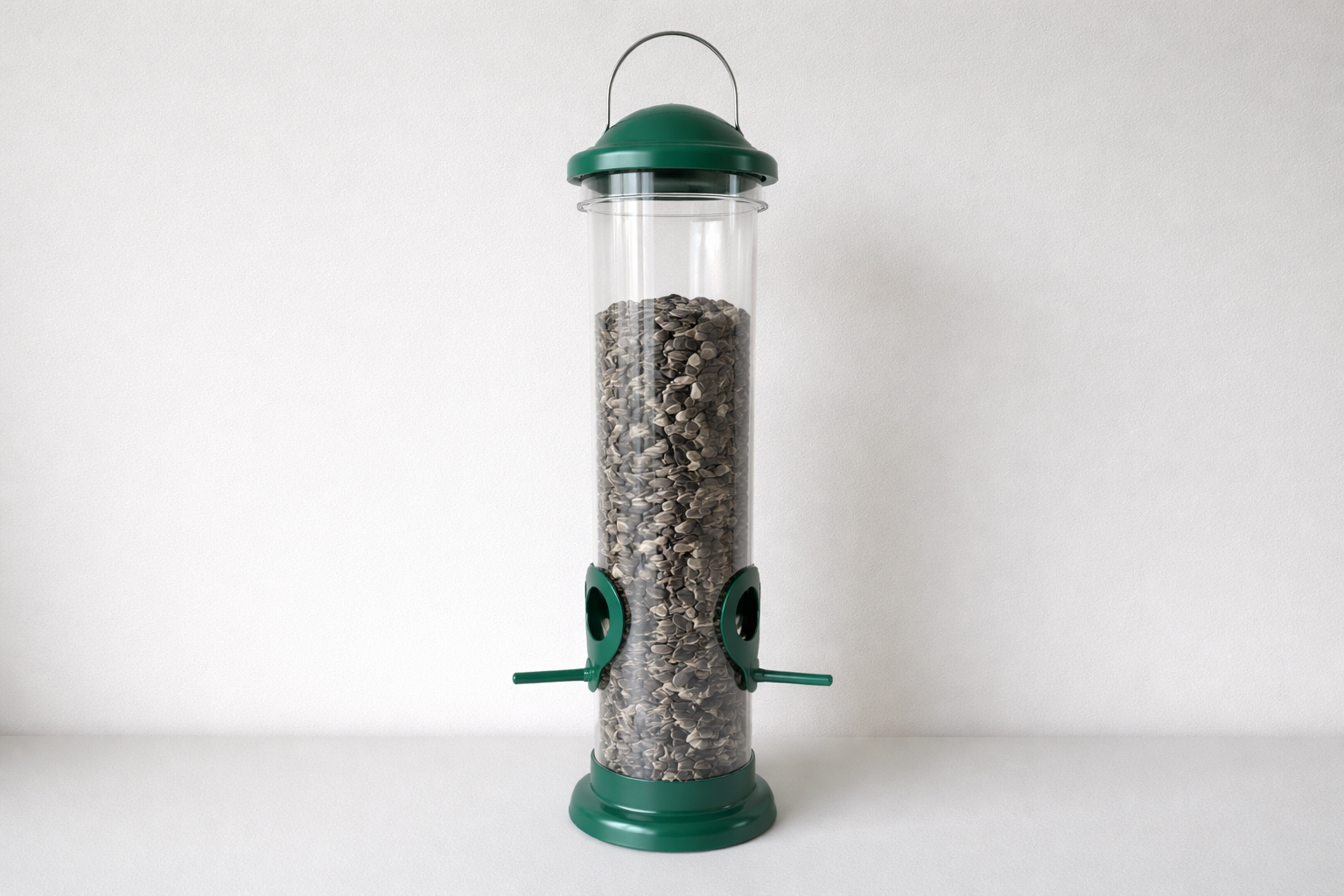 Simple tube feeder for small songbirds, low-contamination design.