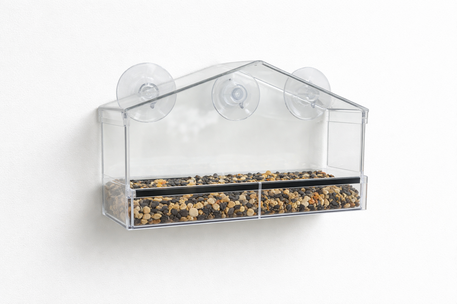 Window-mounted feeder with multiple suction cups and a removable tray for easy cleaning.
