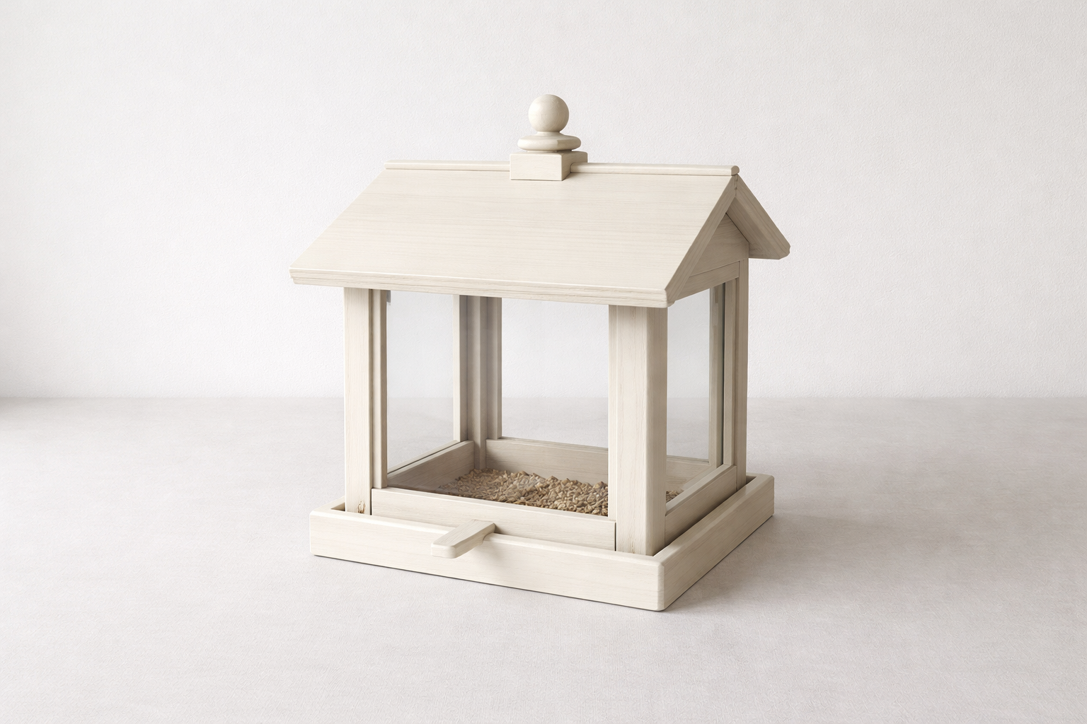 A painted wooden feeder example using exterior paint; allow a full cure before birds return.