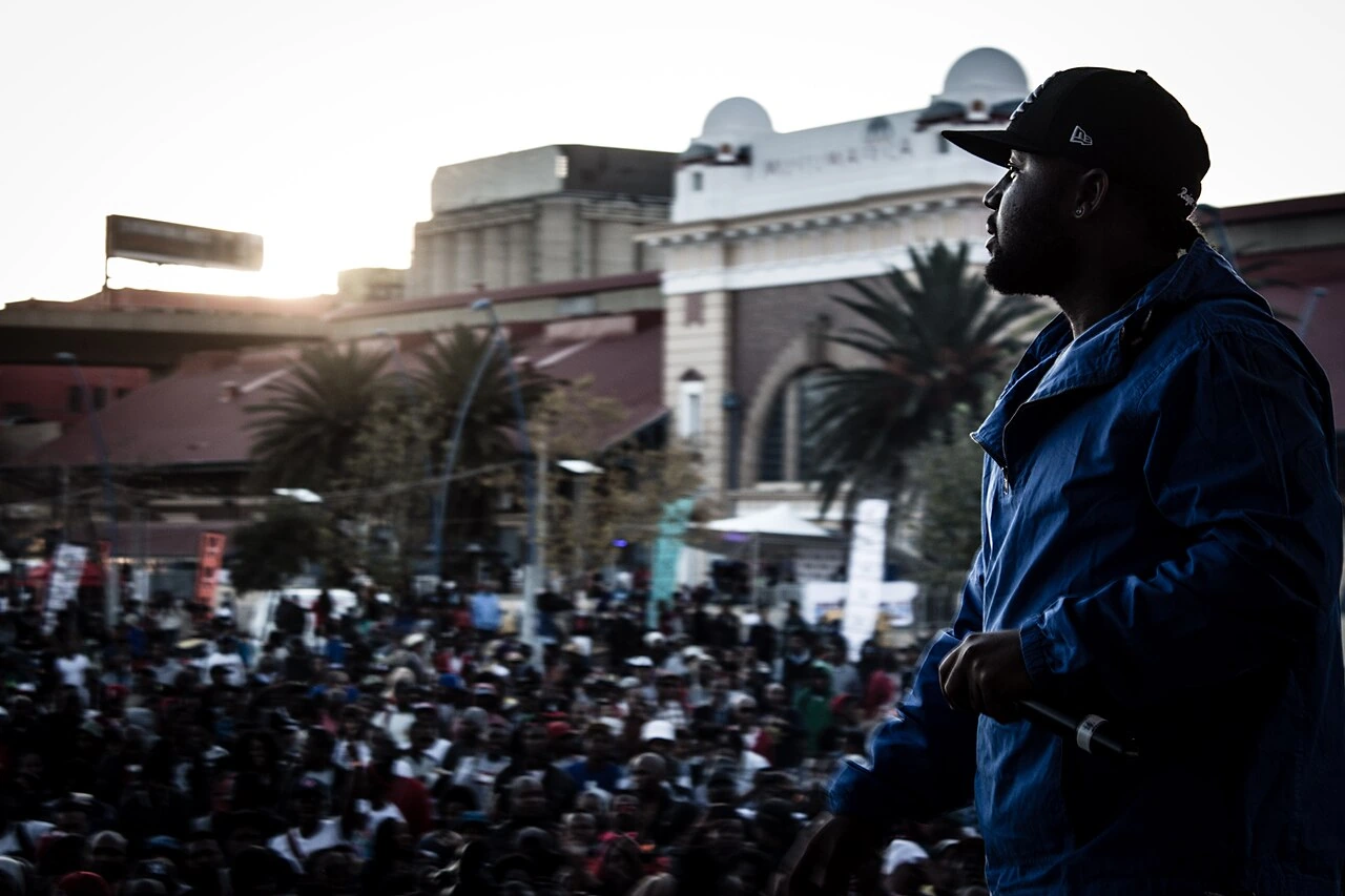 Cassper Nyovest performing on stage in front of a crowd