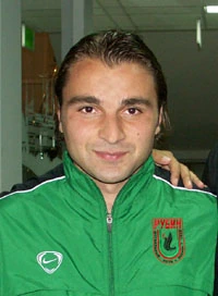 Georgi Kinkladze portrait photo in a green jacket