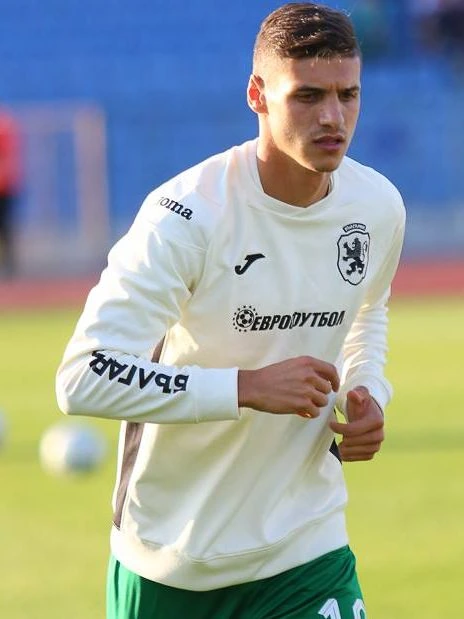 Bulgarian footballer Kiril Despodov in a white training top on the pitch