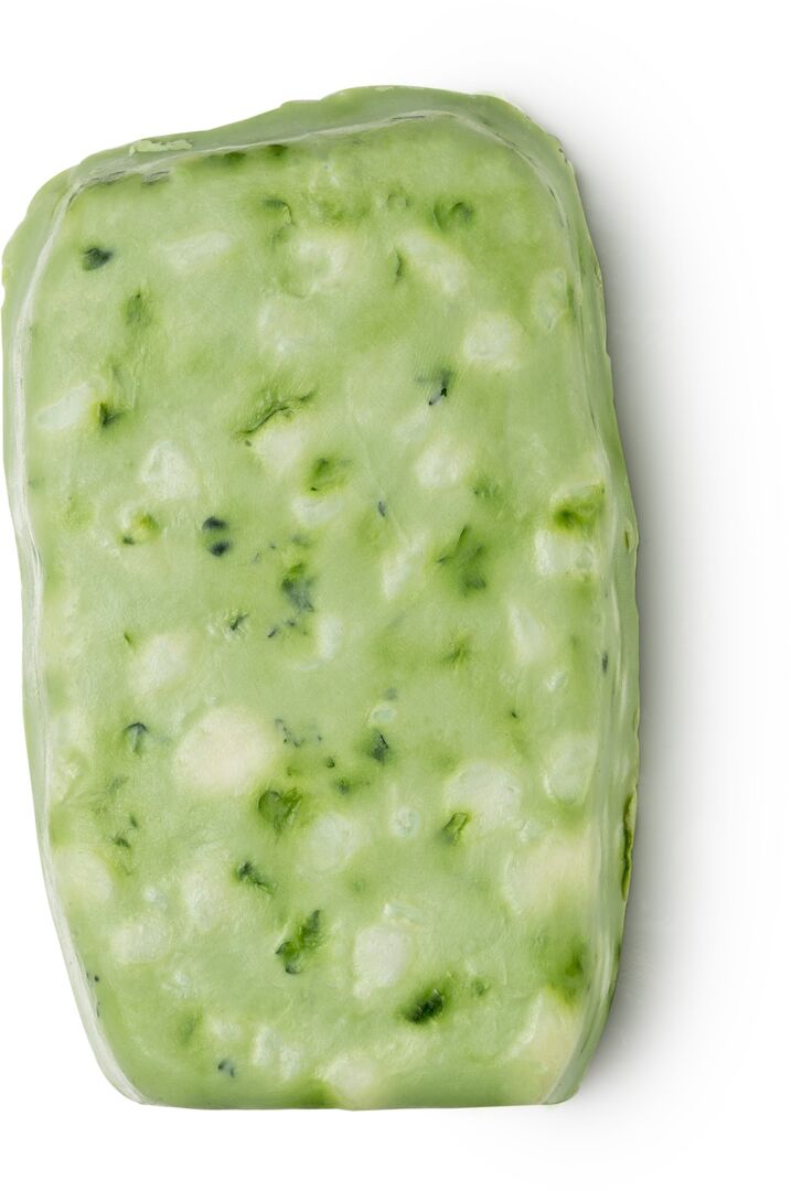 Grünes Seifenstück mit Kräutern