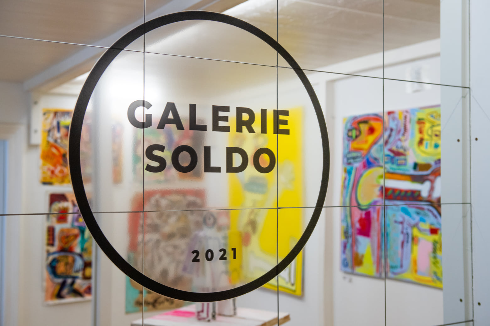 Glastür mit Schriftzug Galerie Soldo